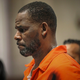 In this Sept. 17, 2019, file photo, R. Kelly appears during a hearing at the Leighton Criminal Courthouse in Chicago. The R&B superstar known for his anthem “I Believe I Can Fly,” was convicted Monday in a sex trafficking trial after decades of avoiding criminal responsibility for numerous allegations of misconduct with young women and children.